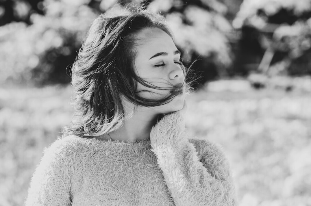 Portrait of a young woman with a warm smile